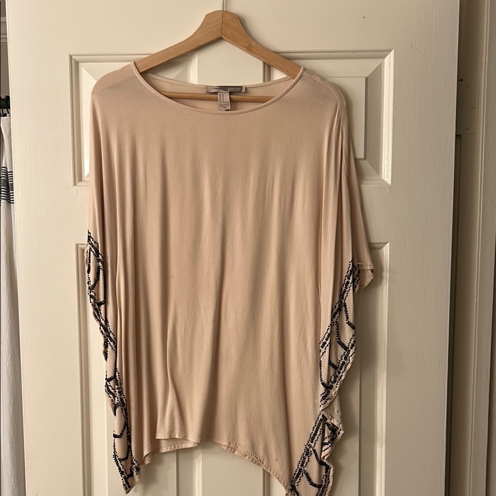 Elegant Beige Top with Black Accents